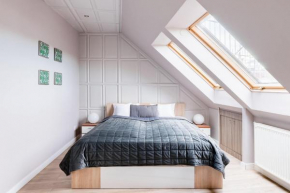 Sunny and Central Penthouse with Private Garage